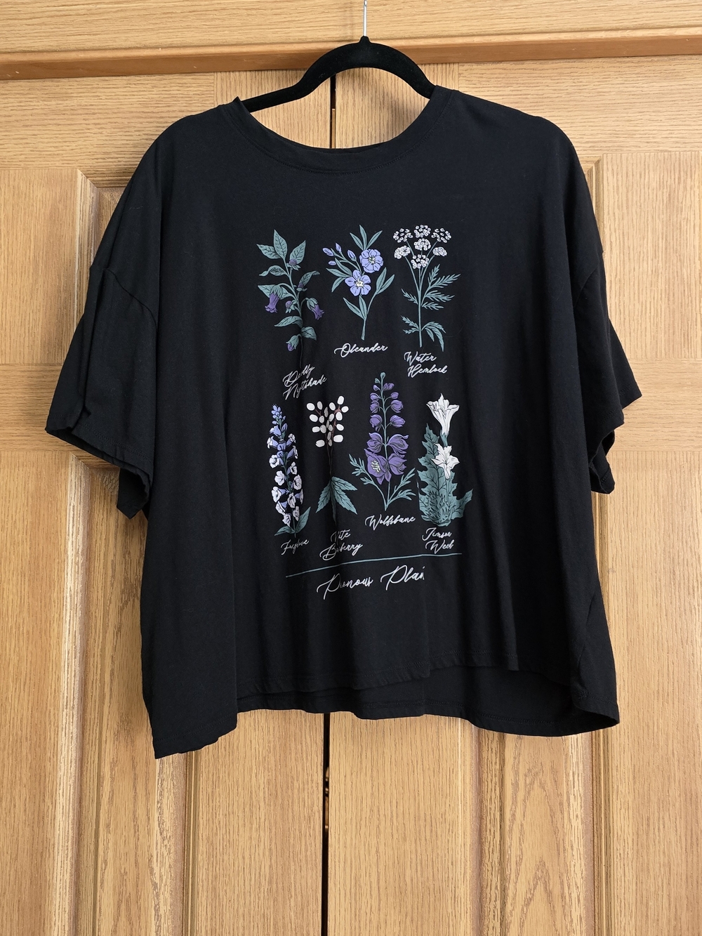 torrid Black Tee with Lavender and Green Floral Graphic